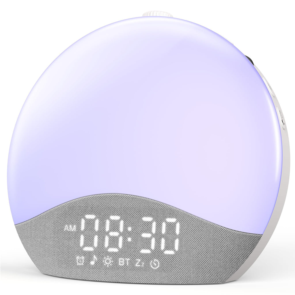 Three-quarter view of Sunla showing the top control dial and side buttons, running in night-light mode